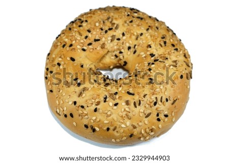 Round baked crispy crackers Breadsticks topped with sesame, fennel, anise and the black seed baraka seeds or nigella sativa, freshly baked and ready to be served, crisp, dry baked bread sweetened Royalty-Free Stock Photo #2329944903