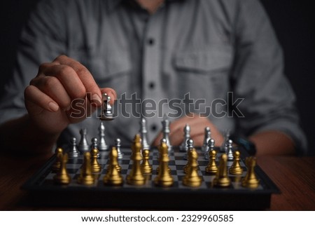 Success and plan in Business Strategy. Businessman in a Chess Game of Skill and Critical Thinking Royalty-Free Stock Photo #2329960585
