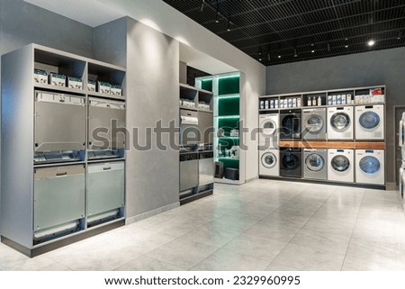 Interior of premium home appliance store in a mall Royalty-Free Stock Photo #2329960995