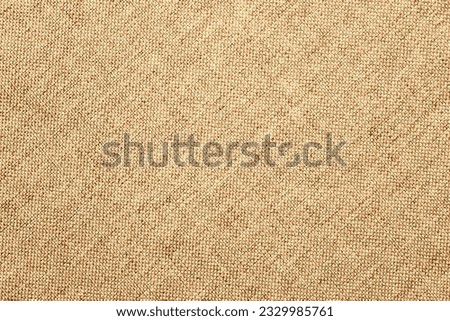 coarse fiber fabric texture, linen sackcloth background Royalty-Free Stock Photo #2329985761