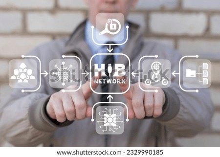 Man using virtual touch screen presses inscription: HUB NETWORK. Web digital networking technology. Hub Network Connection. Information modern cloud networking. Royalty-Free Stock Photo #2329990185