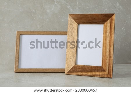 Photo frame on the table, with empty space