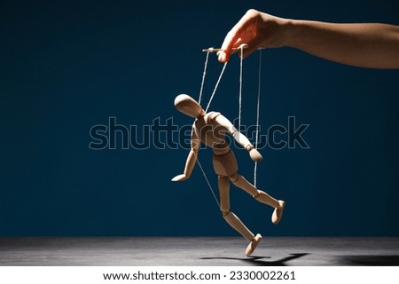 The concept of control and dictatorship over people Royalty-Free Stock Photo #2330002261