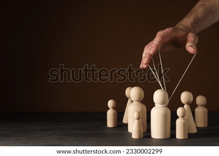 The concept of control and dictatorship over people Royalty-Free Stock Photo #2330002299
