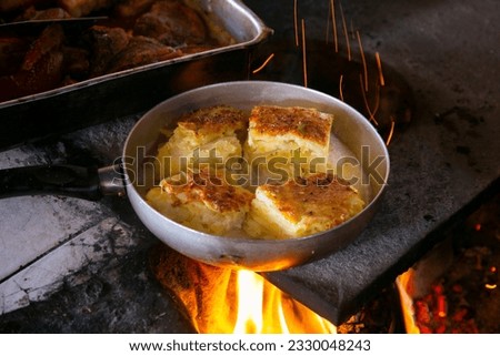Pastel de papa. Potato cake is a dish consisting of a base of potatoes. It is consumed mainly in South American countries. Royalty-Free Stock Photo #2330048243