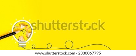 Inspiration creative background design minimalist idea pencil and hand draw of light bulb on yellow background, blank space for text.