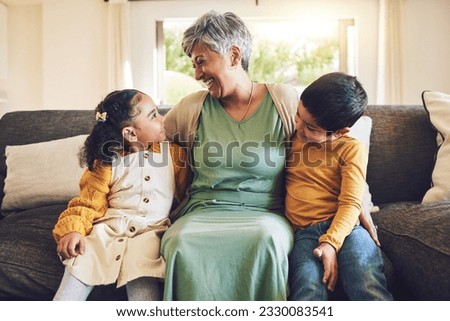 Laughing, grandmother or happy kids on a sofa with love enjoying quality bonding time together in family home. Smile, affection or funny senior grandparent hugging children siblings on house couch Royalty-Free Stock Photo #2330083541