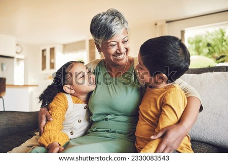 Hug, grandmother or happy kids on a sofa with love enjoying quality bonding time together in family home. Smile, affection or funny senior grandparent with children siblings on house couch laughing Royalty-Free Stock Photo #2330083543