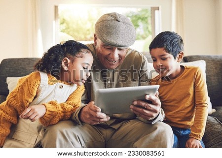 Young kids, grandfather and tablet, relax together and watch cartoon or e learning with games while at home. Bonding, love and spending quality time, old man and grandkids with gadget and internet