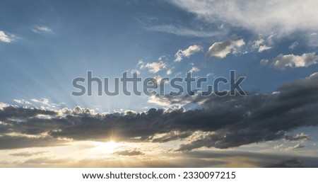 Beautiful bright summer sunset sky with clouds. Nature sky  background. Royalty-Free Stock Photo #2330097215