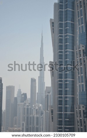 A picture of buildings in Dubai and the building in Dubaih.
