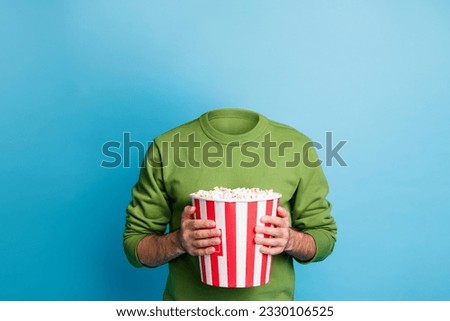 Picture photo sketch collage of unknown unusual weird anonymous guy hold bucket pop cort watching movie isolated on blue color background Royalty-Free Stock Photo #2330106525
