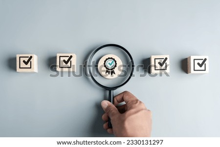 Checklist Quality management with Quality Assurance approval guarantee symbol and improvement. Standardization certification. Compliance to regulations service and standards. Royalty-Free Stock Photo #2330131297