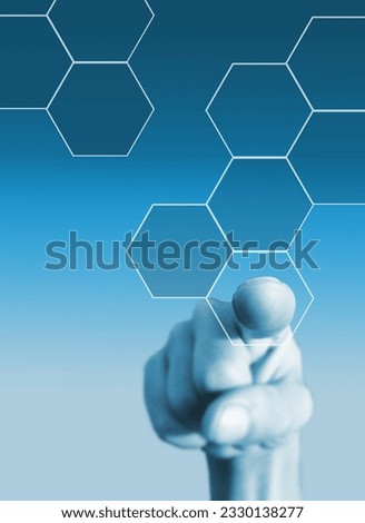 A pointing finger pressing a touch screen button