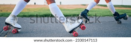 Legs, roller skates and shoes of friends on street for exercise, workout or training outdoor. Skating, feet of people and sports on road to travel, journey and moving for freedom, hobby and fitness