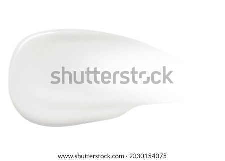 A smear of cream on a white background Royalty-Free Stock Photo #2330154075