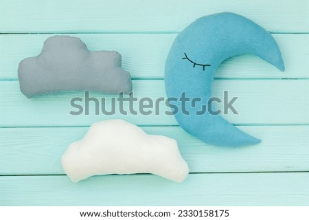 Cute moon pillow with cloud. Bedding for good sleep and rest.