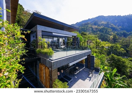 Luxury home with multi-level terraces on the hills of Kalim on Phuket island in the south of Thailand, Southeast Asia Royalty-Free Stock Photo #2330167355
