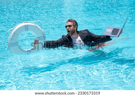 Helping business. Business man in suit hold laptop and help lifebuoy in swim pool. Rescue help swimming ring in water for businessman. Helping business. Save and help business. Helping and rescue.