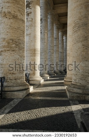 Berninis Colonnade surrounding Saint Peters square in the Vatican.