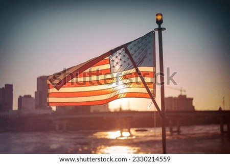 Sunset Behind and American Flag. Flag of the United States.