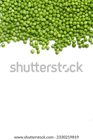 Fresh green peas are scattered on a white background, top view, copy space. Shelled grains of organic green peas on a white background. Vegetable protein, healthy products. Royalty-Free Stock Photo #2330219819