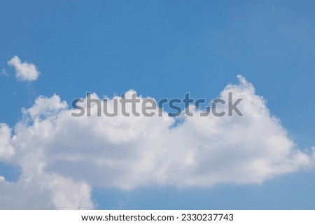 Clouds in the blue sky. Summer blue sky cloud gradient light white background. Beauty clear cloudy in sunshine calm bright winter air background. Image of beautiful blue sky.
