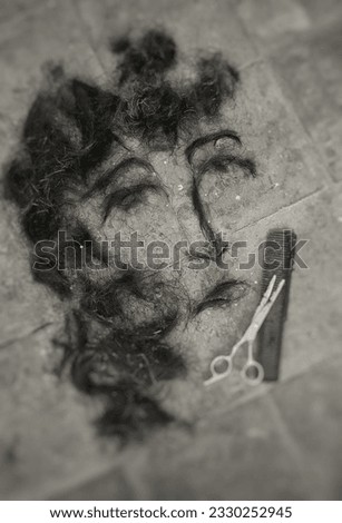 portrait of a beautiful woman's face with black hair clipping media in a barbershop.