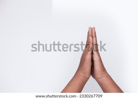 sorry hand gesture on white background