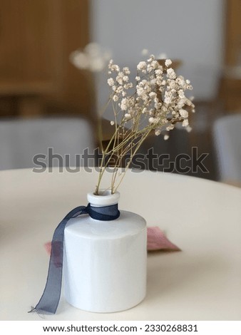 The flower vase was not decorated in the right place. Royalty-Free Stock Photo #2330268831