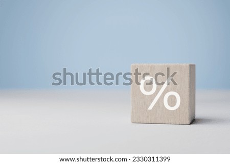 Percent sign. wood cube block with percentage symbol icon. Interest rate, financial, ranking and mortgage rates concept. profit, wealth, leader trends, economic improvement concepts