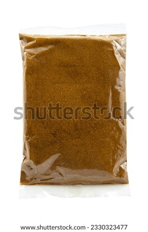 Roasted Curry Powder Packet on White Background Royalty-Free Stock Photo #2330323477