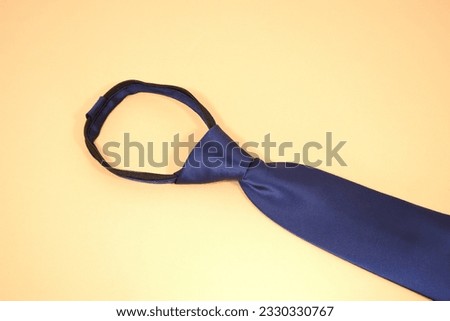 necktie flatlay photography with plain background nobody single object concept 