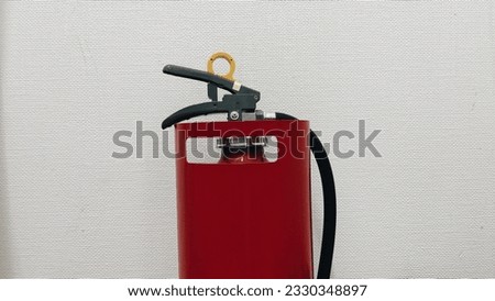 fire extinguisher close up isolated on wall white background