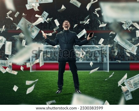 Emotional, lucky, excited businessman feeling success and win of many money on sports betting. 3D arena background. Concept of sport, fan, betting, finances, gambling, bookmaker, modern technologies