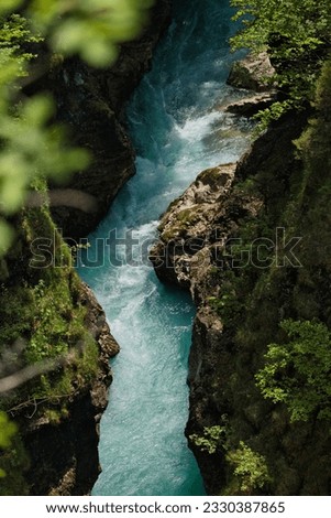 turkoise Glacial river in Bayern Germany Royalty-Free Stock Photo #2330387865