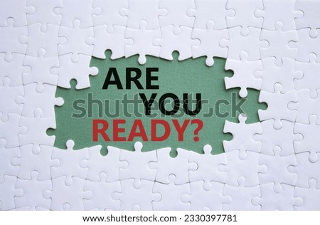 Are you ready symbol. Concept word Are you ready on grey green background with white puzzle. Business and Are you ready concept. Copy space Royalty-Free Stock Photo #2330397781