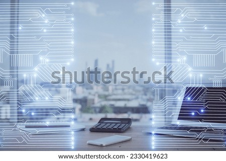 Computer on desktop in office with technology theme hologram. Multi exposure. Tech concept.