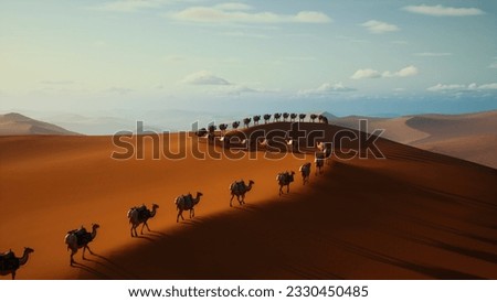 Desert camel caravan procession transport Royalty-Free Stock Photo #2330450485