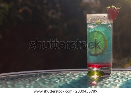 Iced rainbow lemonade cocktail. with copy space. perfect for recipe, article, catalogue, or any cooking contents. 