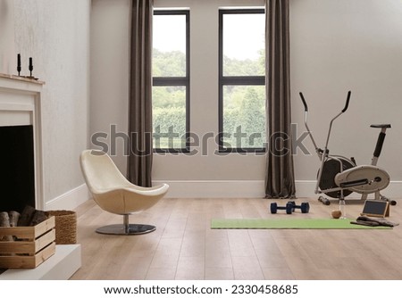 Sport in the home concept with bike and mat, wall chair and room interior style.