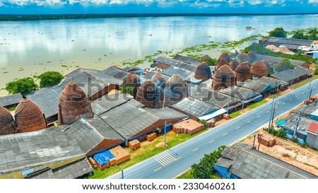 Aerial view of Mang Thit brick kiln in Vinh Long. Burnt clay bricks used in traditional construction of Vietnamese. Mekong Delta, Vinh Long, Vietnam