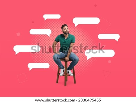 Communication, dialogue. Handsome young man sitting on stool against red background. Speech bubbles around him