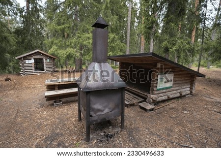 A cozy place for a picnic in the forest in the nature of Estonia. High quality photo