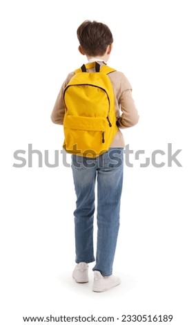 Little boy with schoolbag on white background, back view Royalty-Free Stock Photo #2330516189
