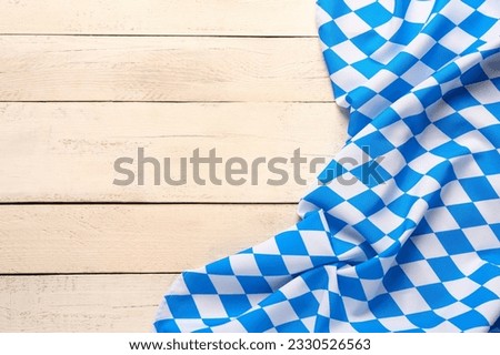 Flag of Bavaria on white wooden background Royalty-Free Stock Photo #2330526563