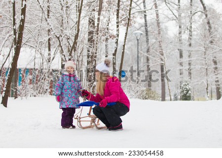 Family walking in a winter park