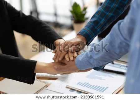 Cooperation and unity in the collaboration of people in the organization. Handshake of business partners at a meeting. Royalty-Free Stock Photo #2330581591