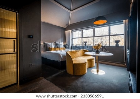 Stylised contemporary boutique hotel room and suite Royalty-Free Stock Photo #2330586591