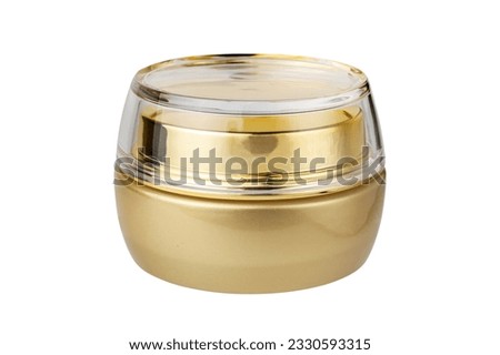 Gold jar of cream isolated on white background. High quality photo